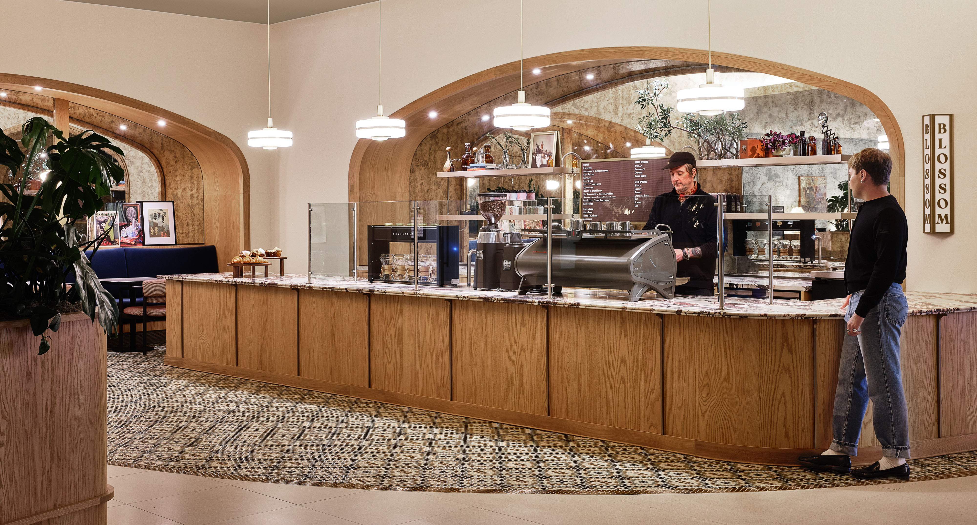 Live Sawn Red Oak Veneer Wood Paneling cash wrap and millwork in a modern coffee shop