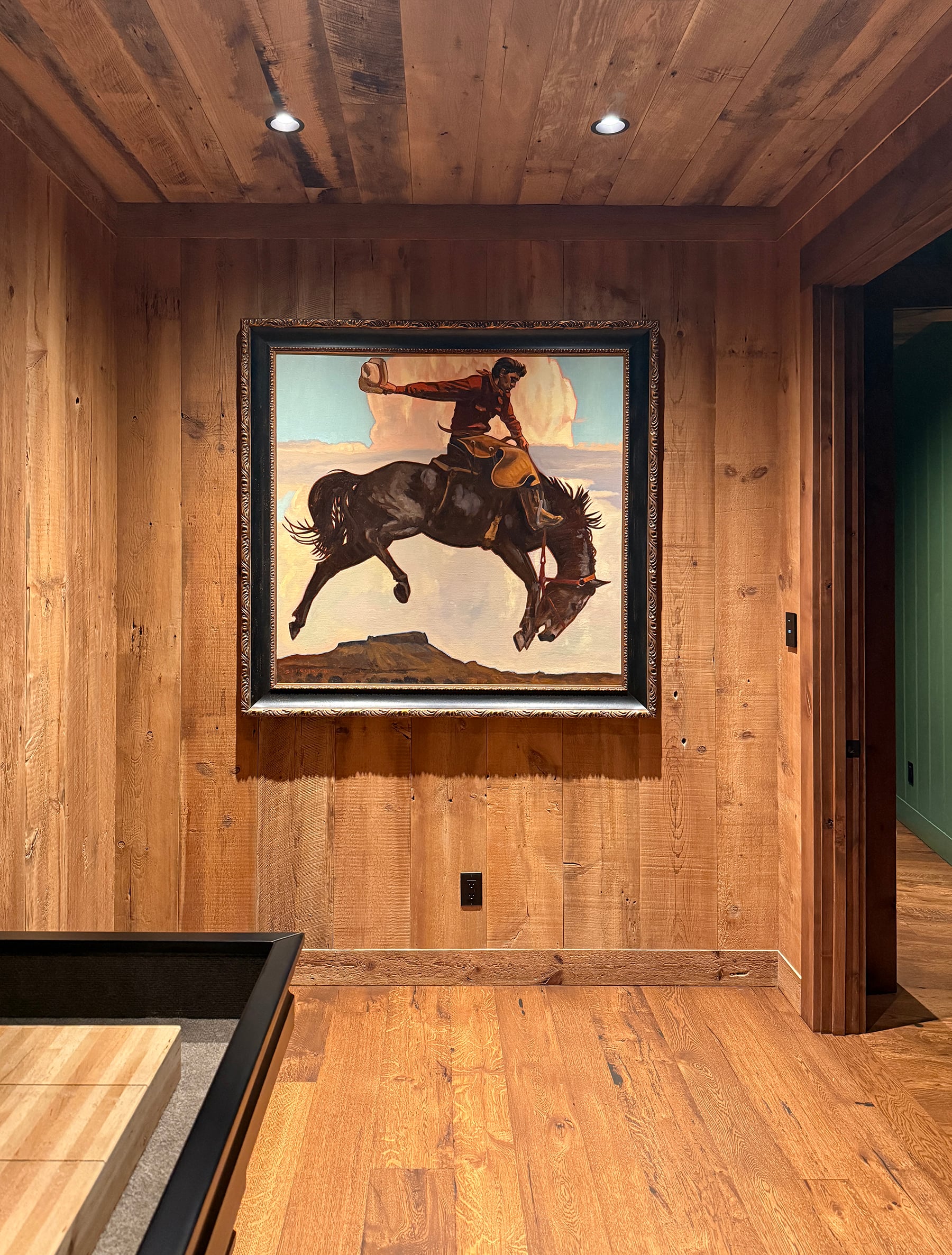 Steamboat home interior with horse painting on the wall