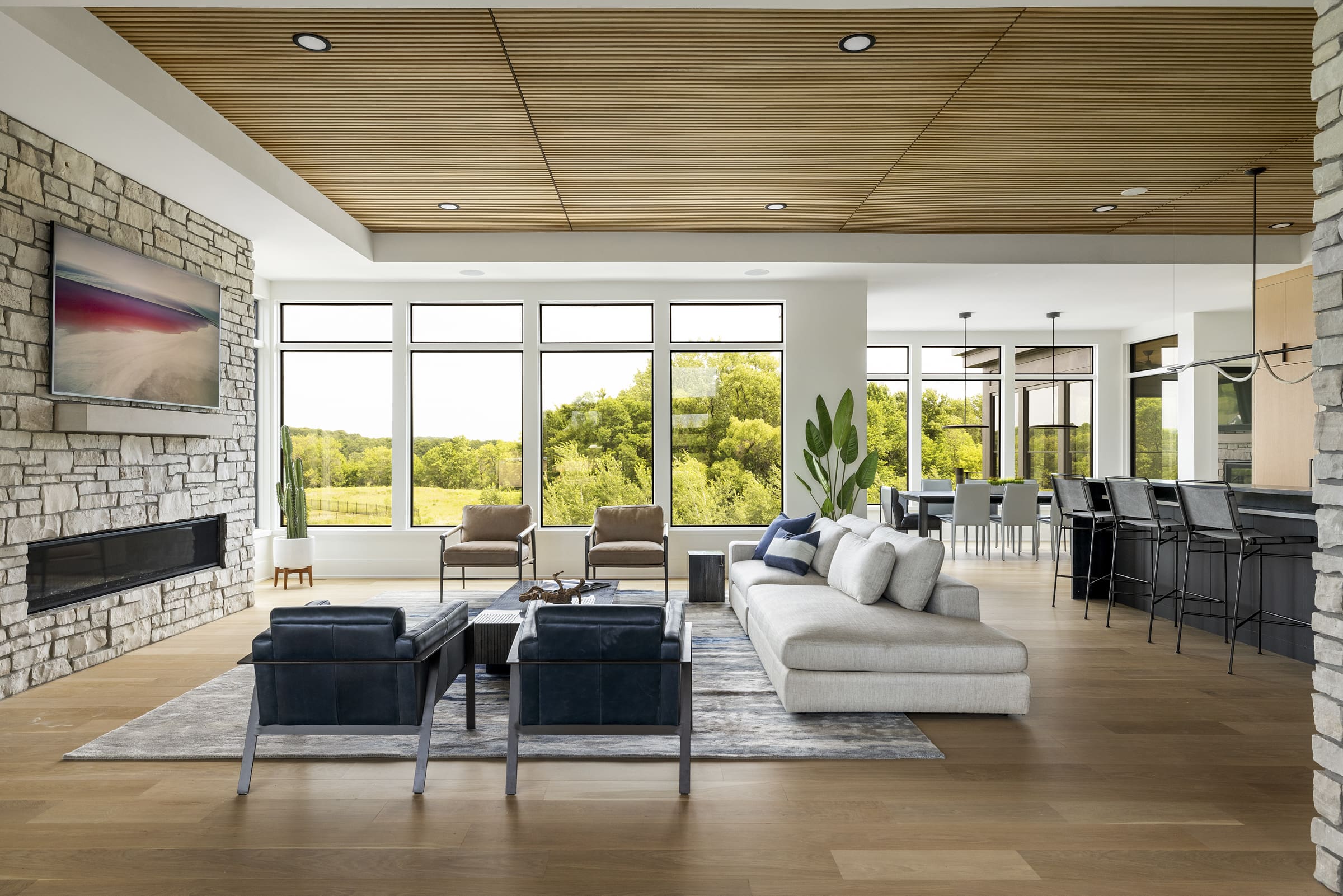 White Oak Classic Slat Ceiling Panels installed in an open concept living space