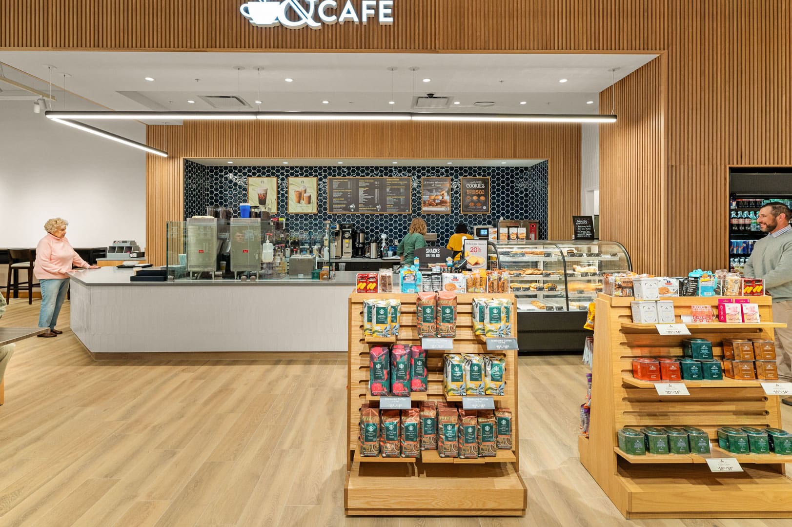 White Oak Classic Slat Wall Paneling installed in a retail store cafe