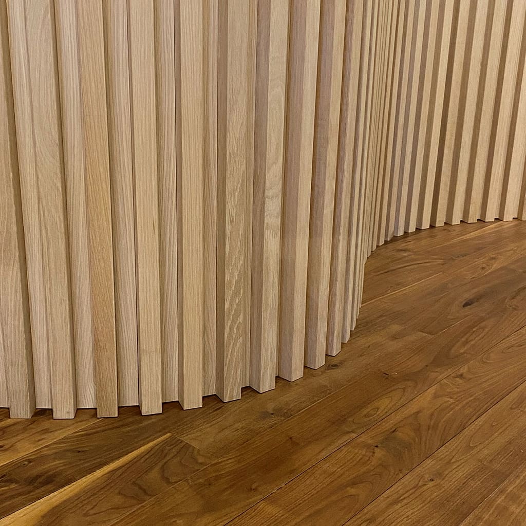 Image of Curved Slatted Wood Wall Paneling