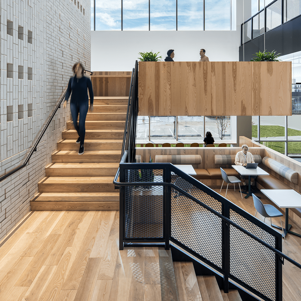 Live Sawn Solid Ash Flooring installed in a corporate office atrium