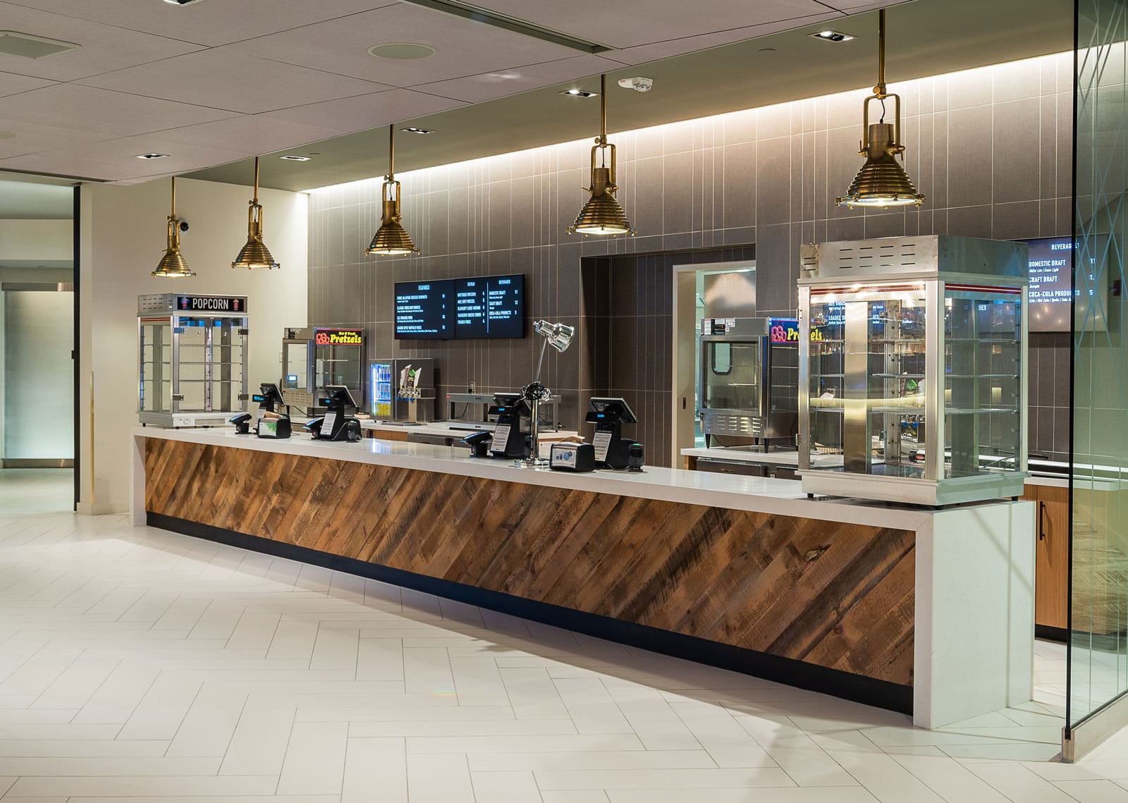 Reclaimed Rough Patina Pine Cash Wrap installed at Fiserv Forum sports arena