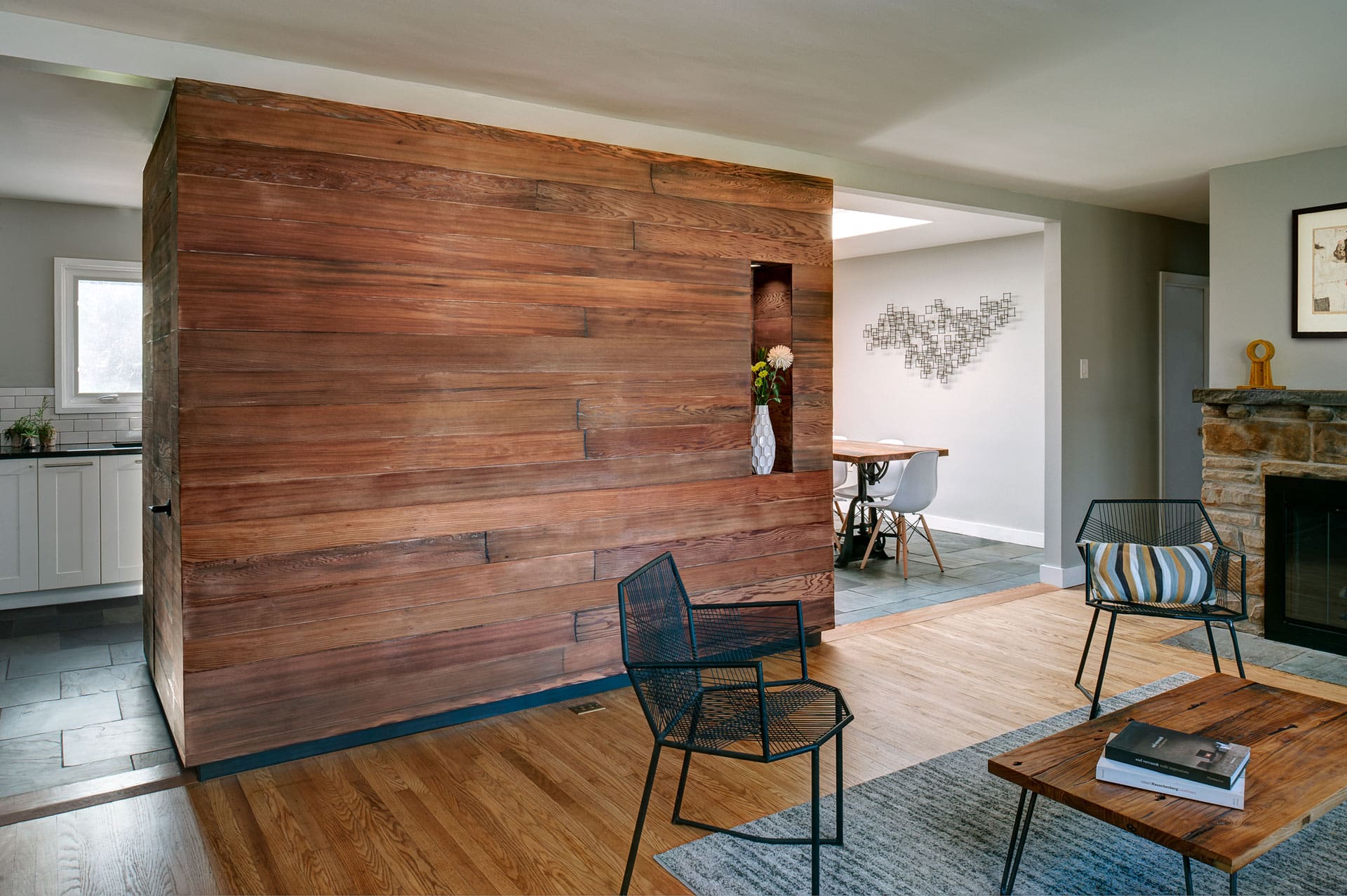 Reclaimed Oak Fencing Flooring and Redwood Cladding in living room installation