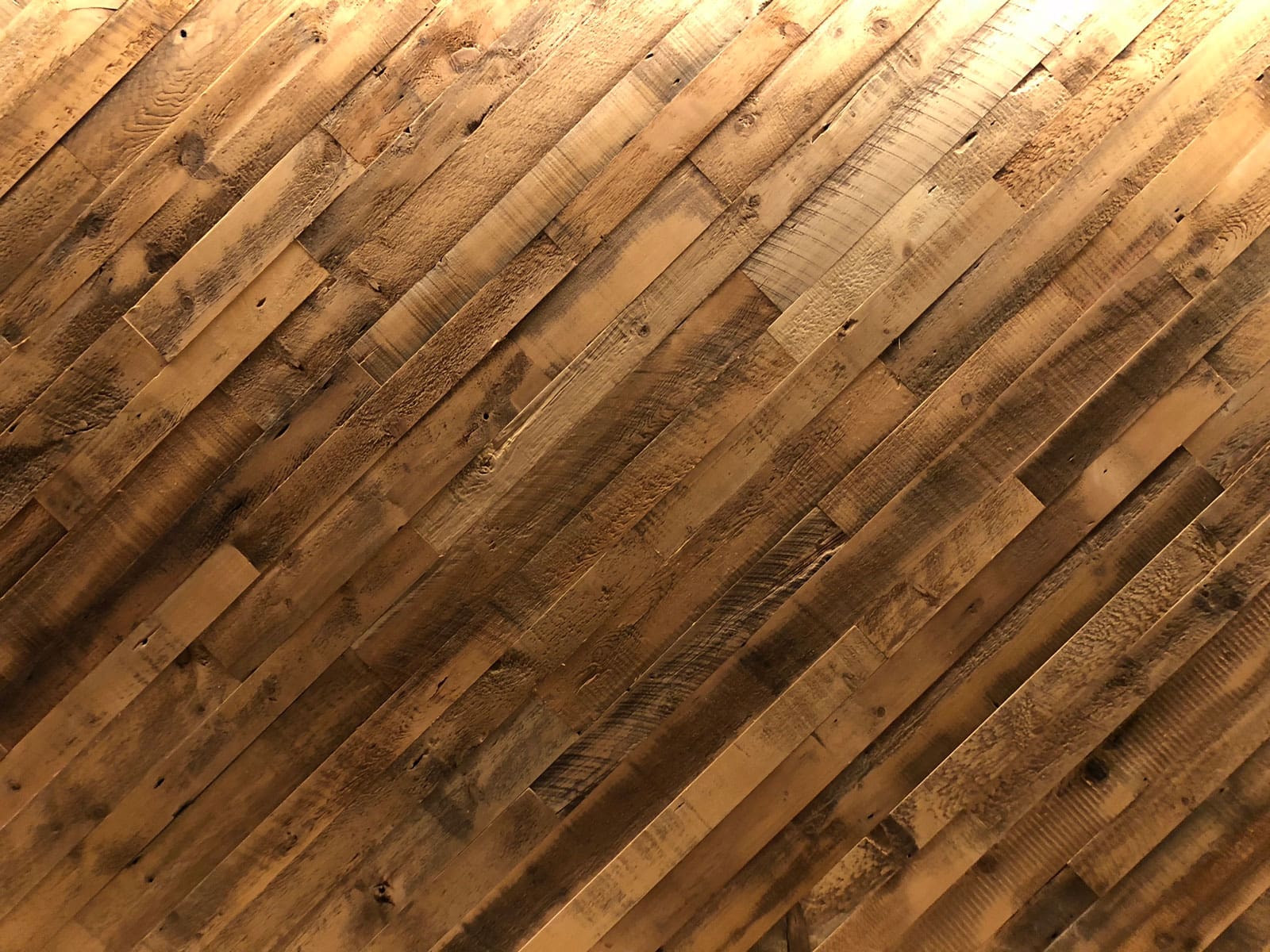 Reclaimed Rough Back Cladding installed on a custom cash wrap