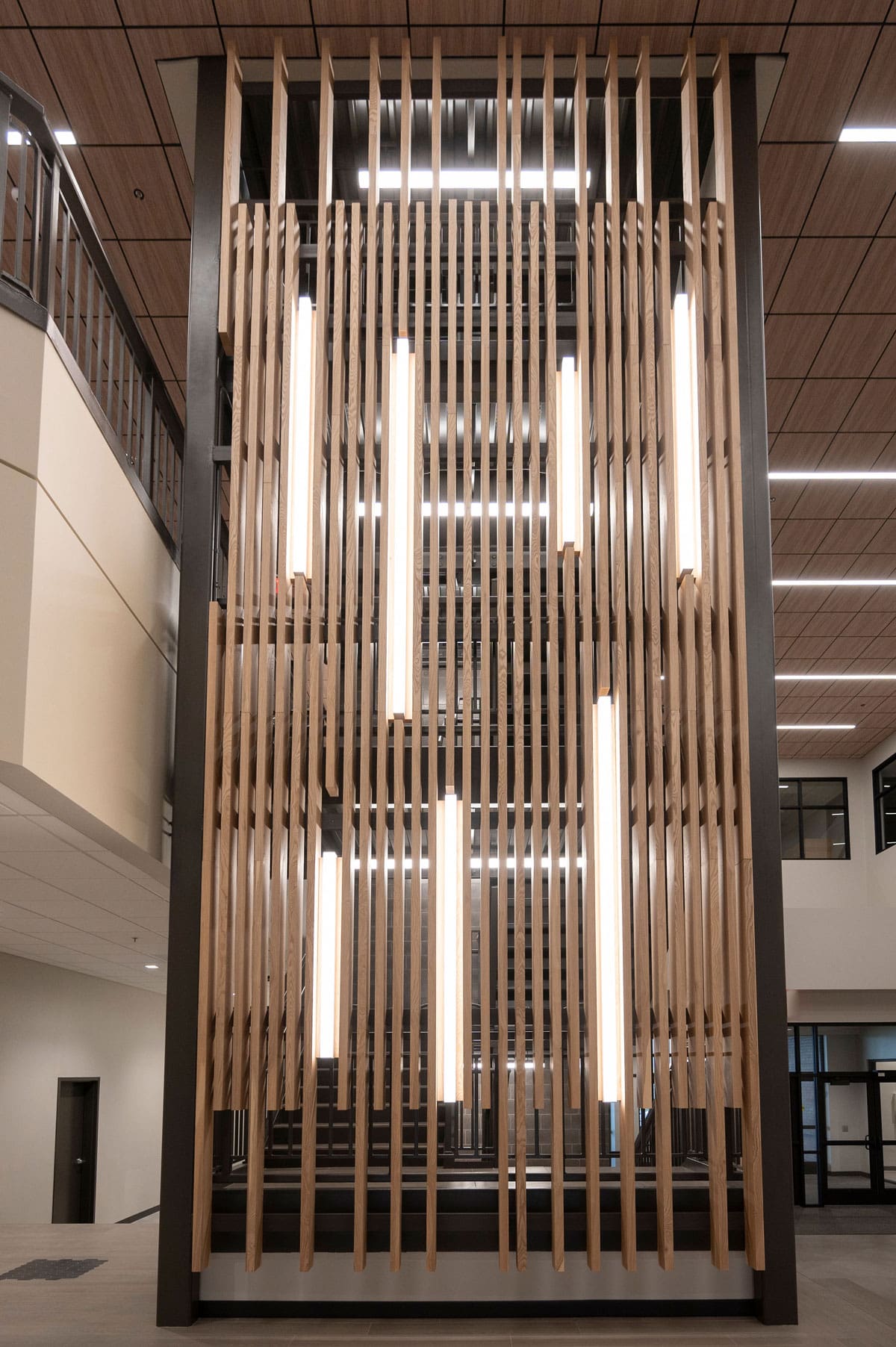 Urban Ash Pass Through Wood Slat Feature Wall installed in a corporate lobby