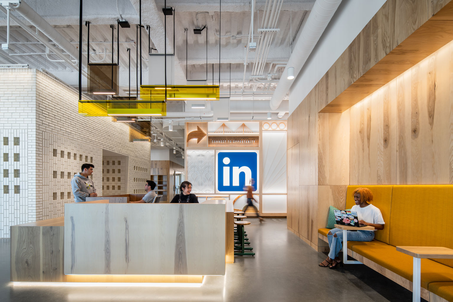 Office Lobby Featuring Urban Wood Ash Veneer Panels in Matte Clear