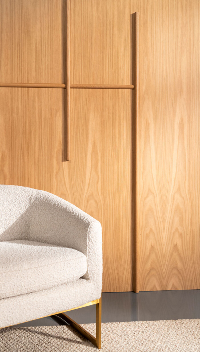 Open Grid Dimensional Wood Wall Panel in White Oak with Chair